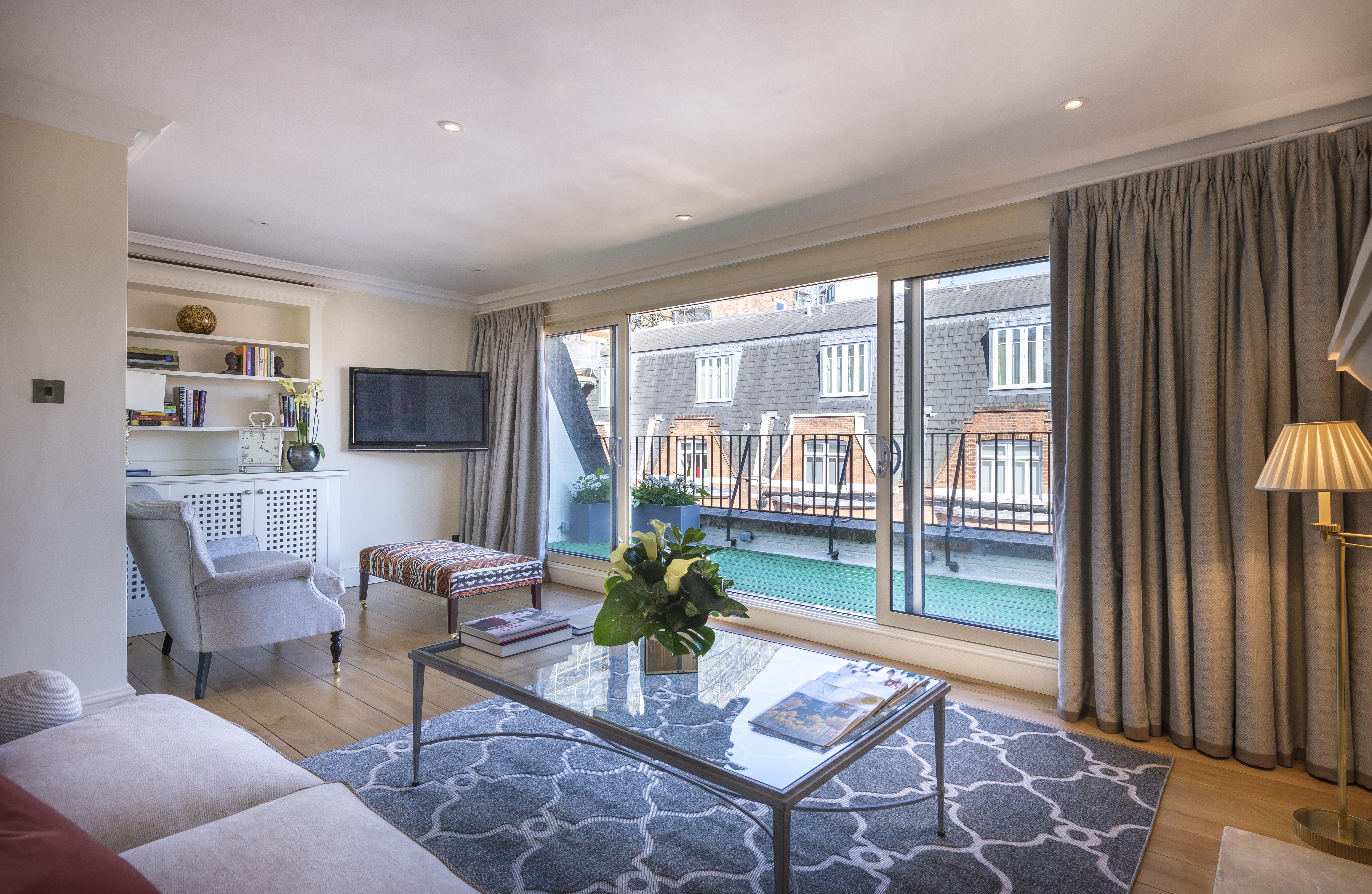 The Capital Hotel, Apartments & Townhouse Londres Exterior foto A living room at the hotel