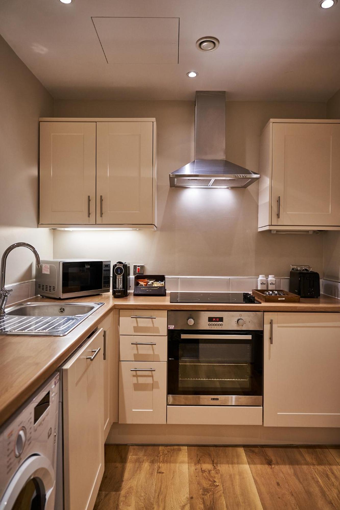 The Capital Hotel, Apartments & Townhouse Londres Exterior foto A modern kitchen