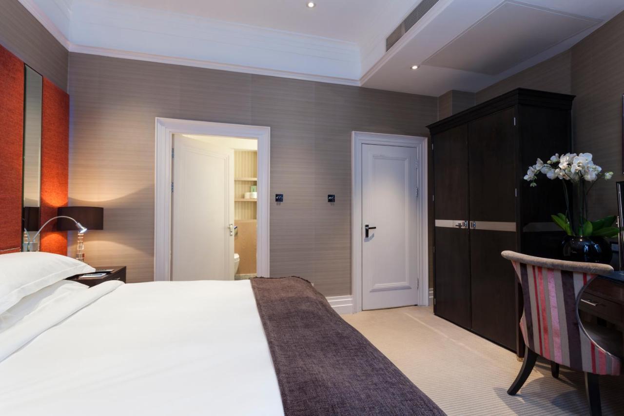 The Capital Hotel, Apartments & Townhouse Londres Exterior foto A bedroom at the hotel